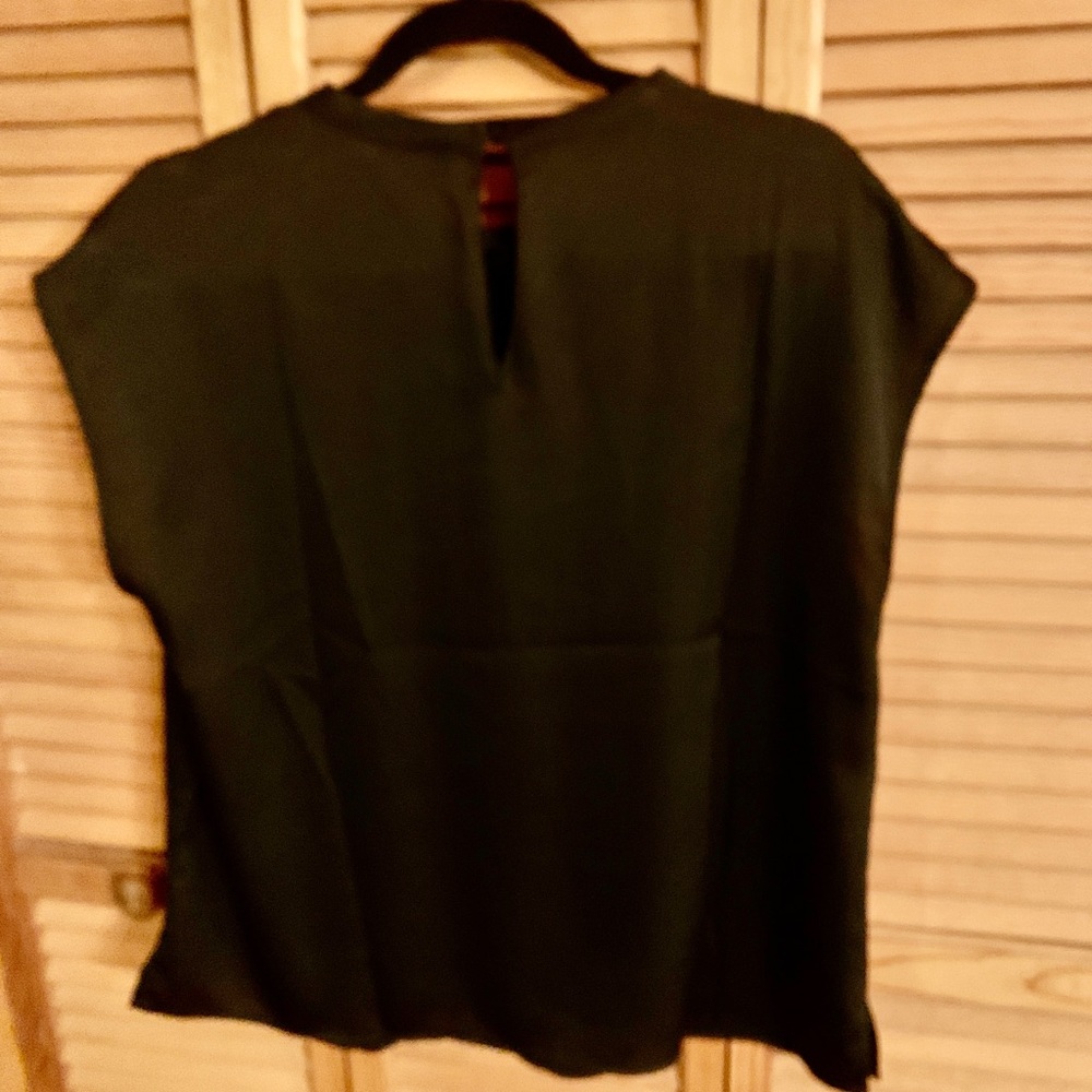 Vince Camuto black shell.